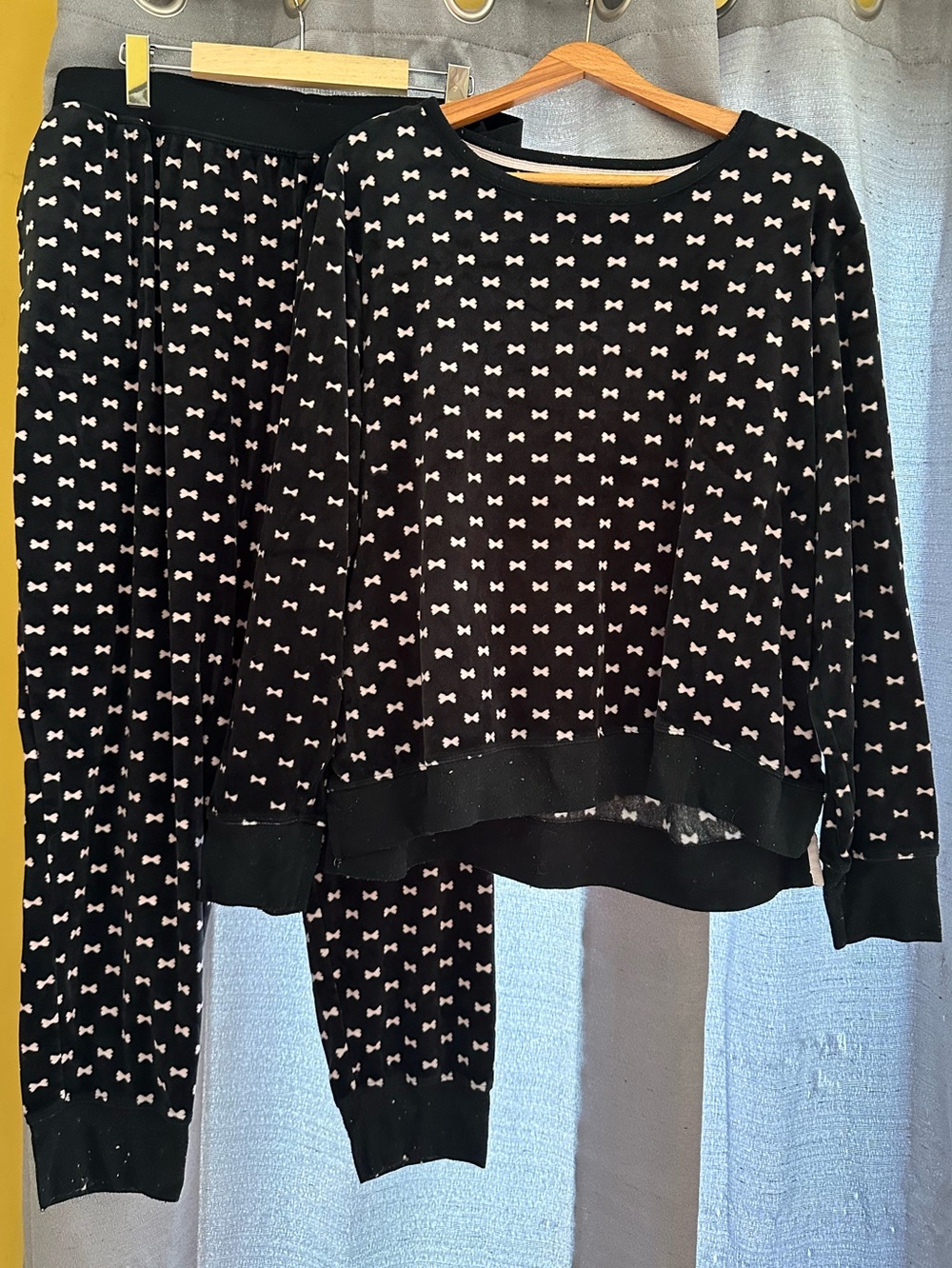 Cozy Kate Spade New York black velour PJ set with all-over bow print